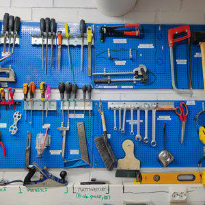 Tools on a blue wall