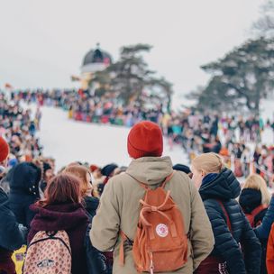 Winter, students and snow in a park
