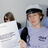 Students holding the parliamentary election programs