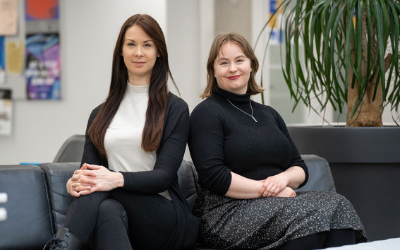 Two people looking at the camera