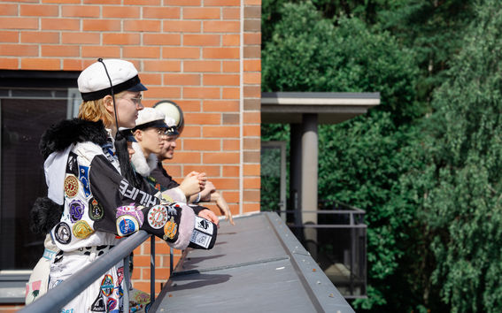 Students at a one-time rental facility balcony