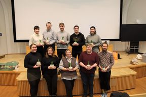 Pictured AYY board members 2023 smiling and holding plants