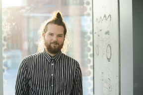 A person smiling for the camera