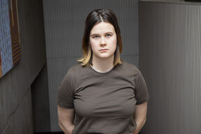 Board member Katariina Kokkonen watch to the camera looking sad