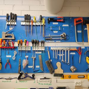 Tools on a blue wall