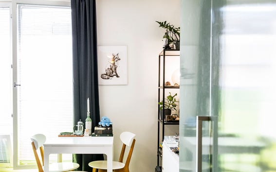 A small dining table in a light apartment.